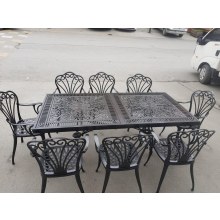100x200 CM. Alüminyum döküm masa ve sekiz adet kollu döküm sandalye